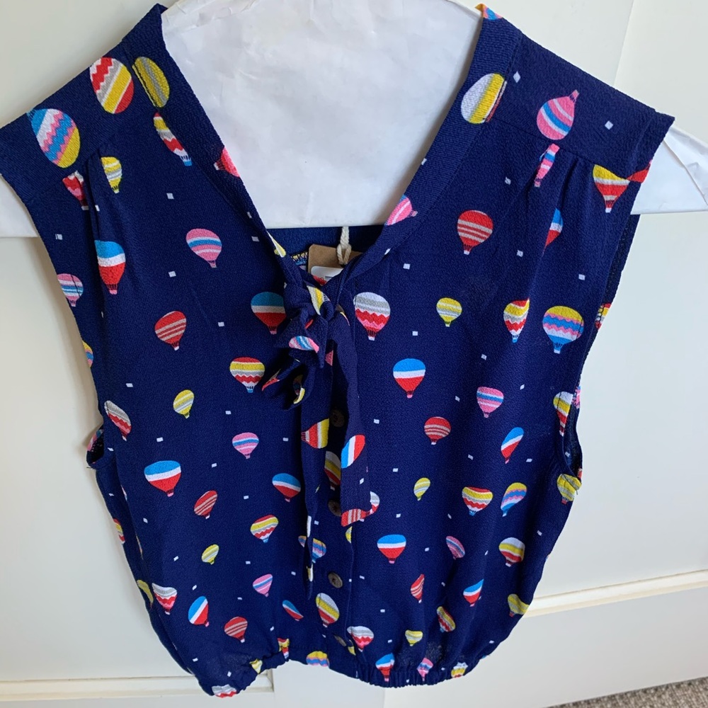 Italian top-with tags still on
